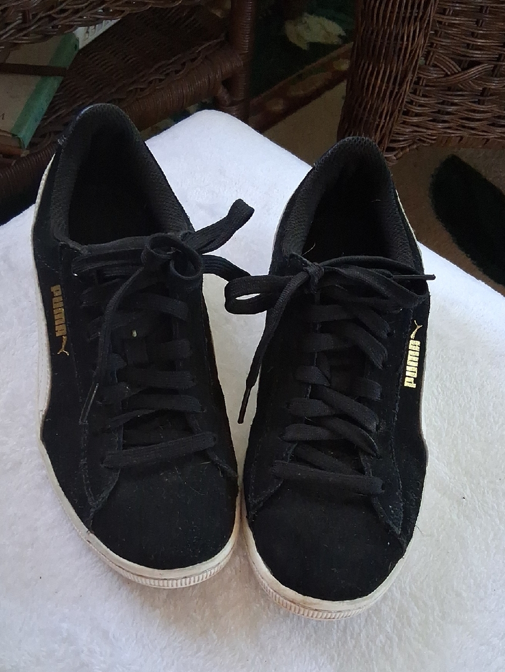 Puma Black Suede Sneakers with Gold Logo Accent